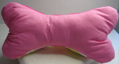 side three of the Heart Bone Pillow is a soft pink color. 