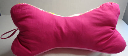 Side two of the Heart bone pillow is  a vibrant pink fabric.